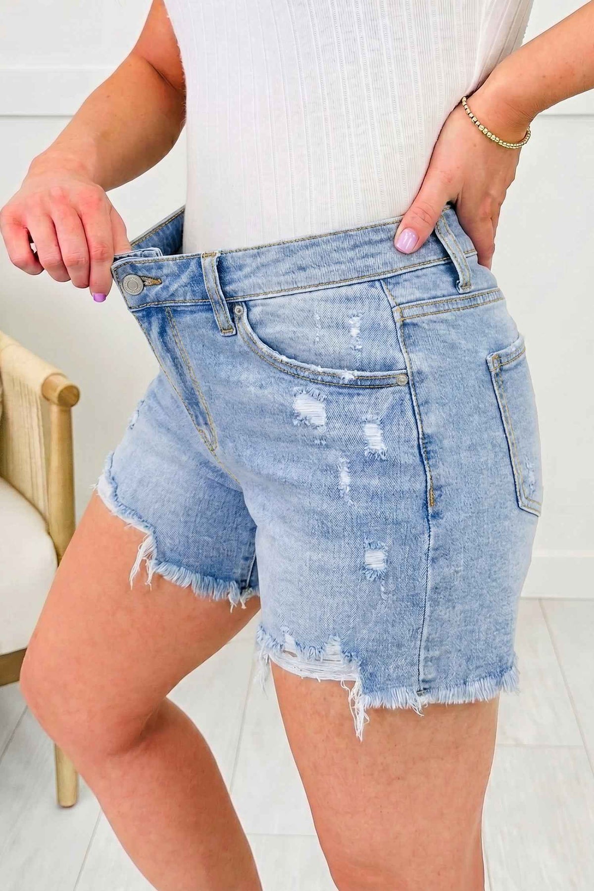Beau Blue Asymmetric Raw Hem Distressed Whiskery Denim Shorts