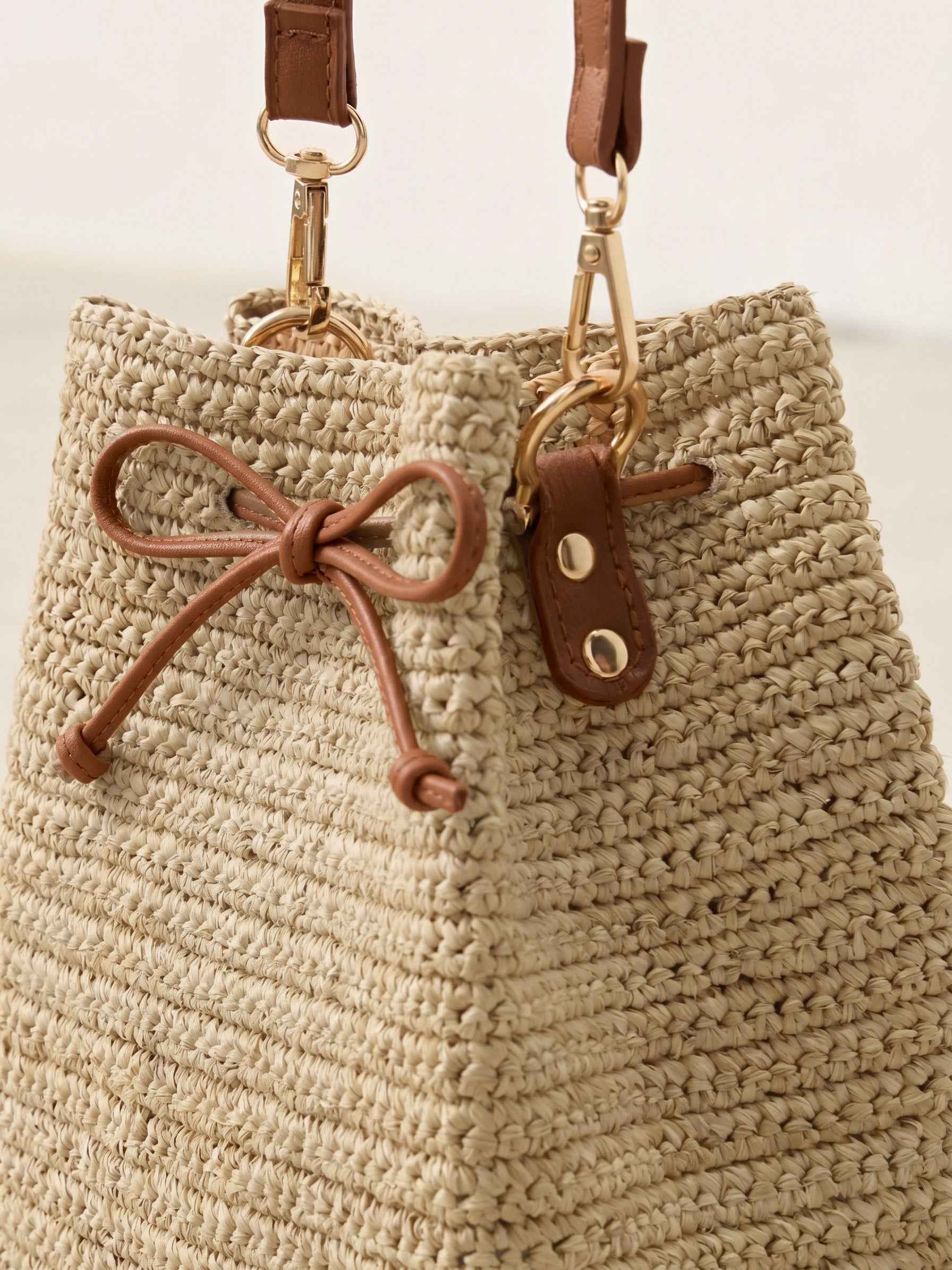 Mini Handwoven Raffia Drawstring Crossbody Bag