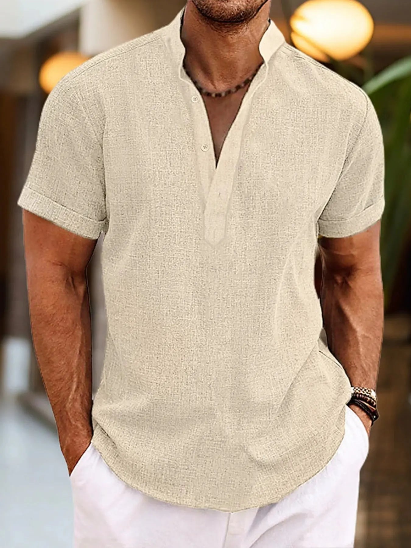 Man wearing a beige short-sleeve shirt-DEA Collection 