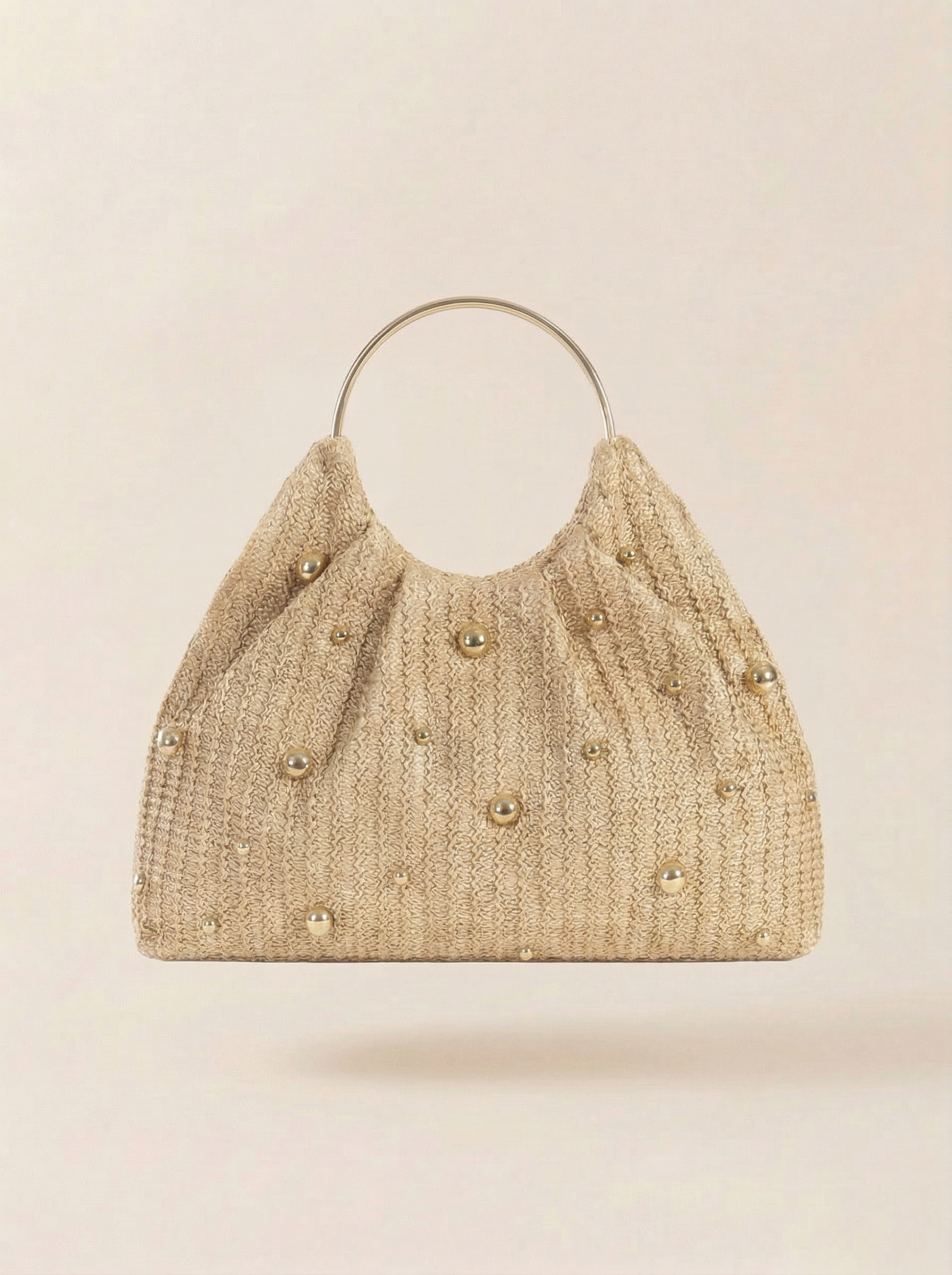 Artisanal Studded Handwoven Raffia Bag with Sculptural Gold Ring Handle - DEA collection
